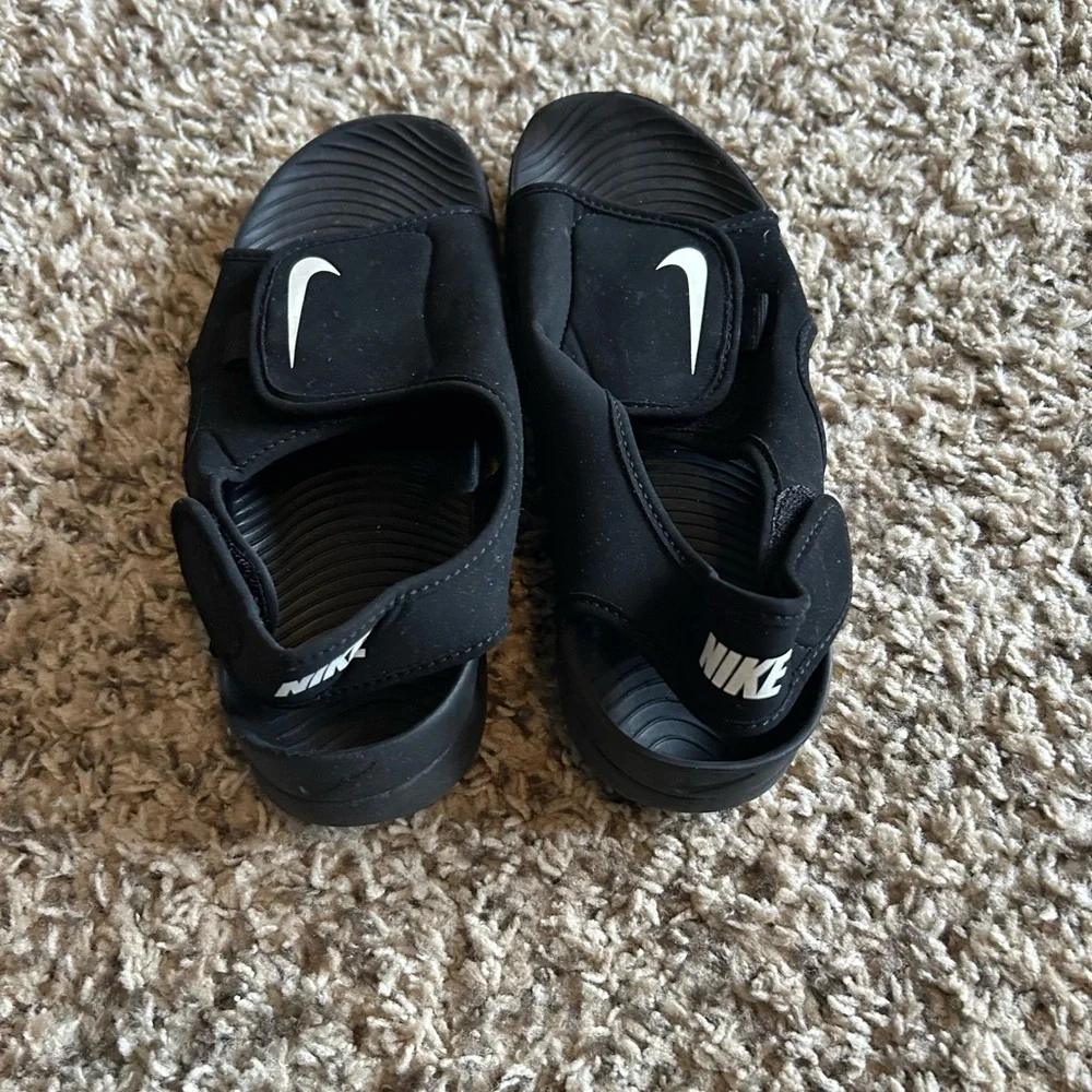 Nike Kids Black Slide Sandals with White Swoosh Accent